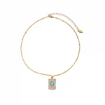 FY’s gold snake chain necklace with shell and turquoise pendant, layered with beaded bracelets for boho summer style.