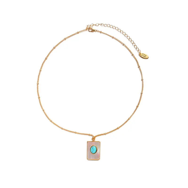 FY’s gold snake chain necklace with shell and turquoise pendant, layered with beaded bracelets for boho summer style.