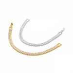 FY’s gold bold chain bracelet with cubic zirconia, styled with a blazer and watch for power office elegance.