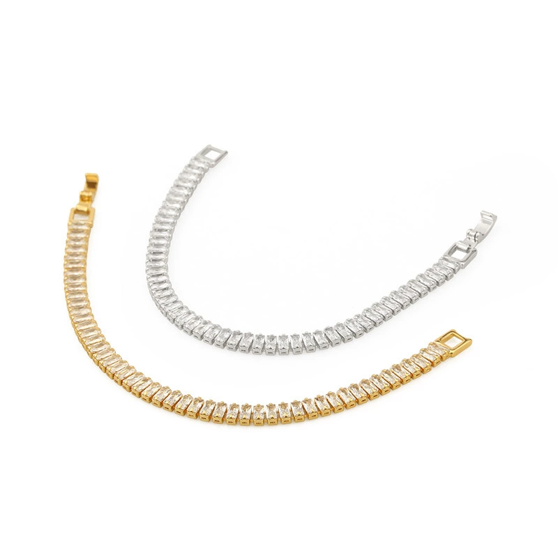 FY’s gold bold chain bracelet with cubic zirconia, styled with a blazer and watch for power office elegance.