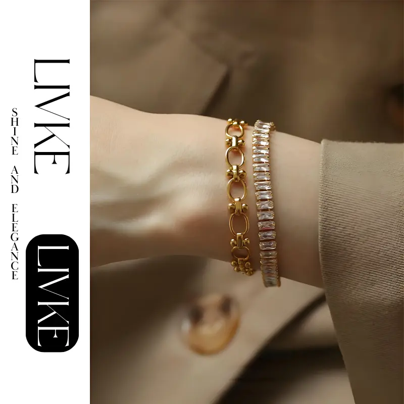 FY’s gold bold chain bracelet with cubic zirconia, styled with a blazer and watch for power office elegance.