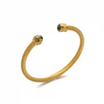 FY’s minimalist gold adjustable bangle bracelet styled with a white button-up for office elegance.