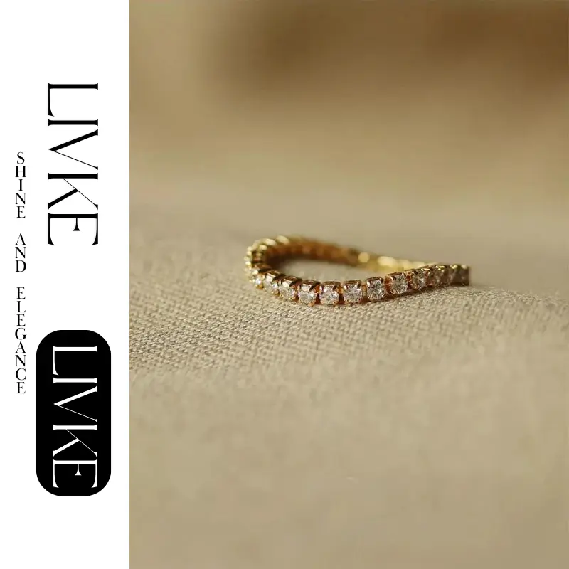 FY’s gold vintage chain ring with zirconia details, stacked with minimalist bands for office-ready elegance.