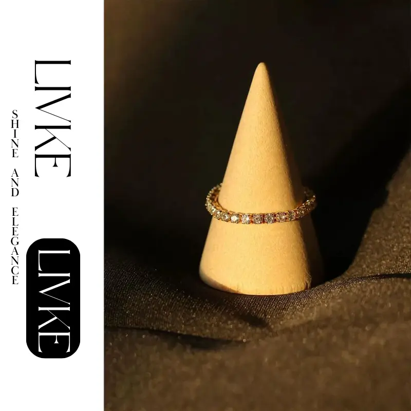 FY’s gold vintage chain ring with zirconia details, stacked with minimalist bands for office-ready elegance.