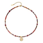 FY surgical steel necklace with red agate and turquoise beads, layered with minimalist chains for boho-chic styling